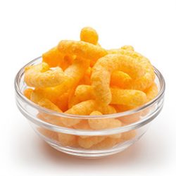 Cheese puffs in a glass bowl, Isolated on a white background